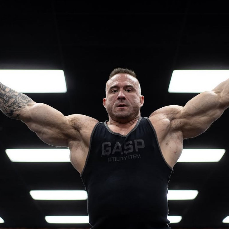 Portrait of Chris DiDomenico, IFBB Pro bodybuilder and contest prep coach at Iron Physique